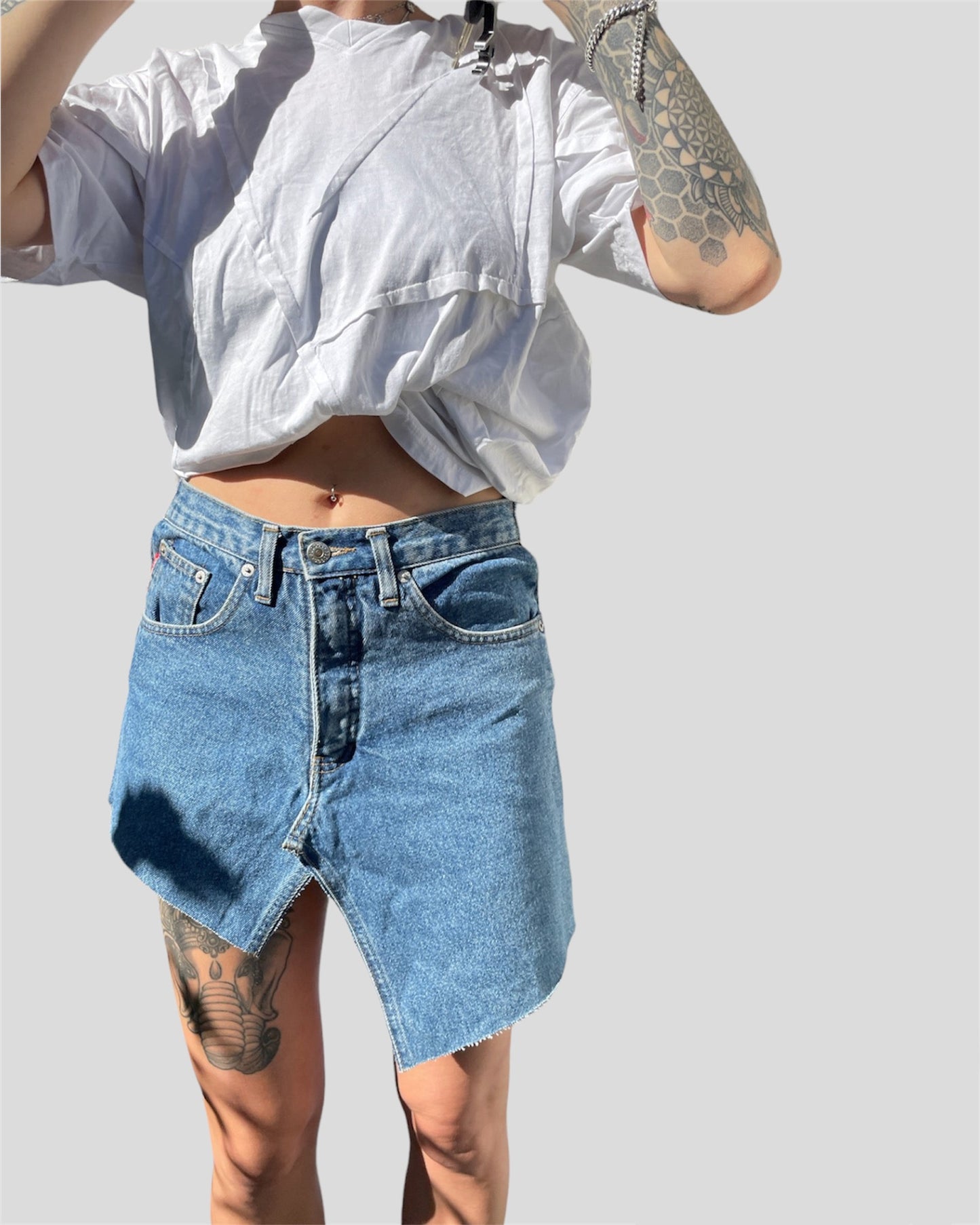 ASYMMETRICAL DENIM MINI SKIRT